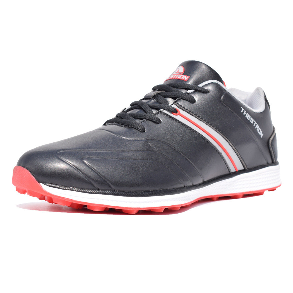 Black and red athletic shoe on a white background