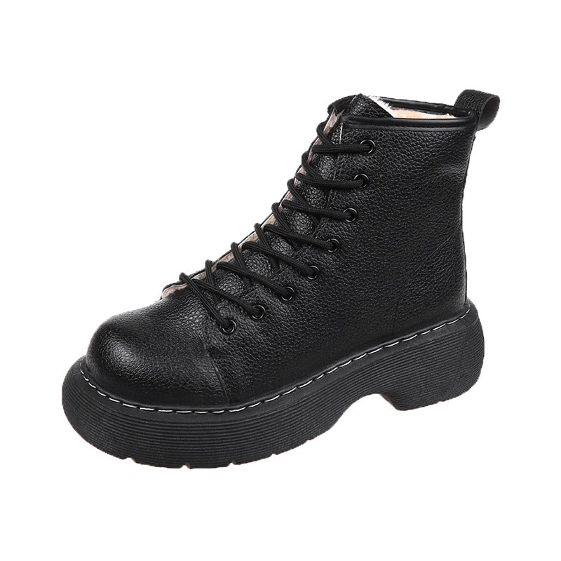 Black leather boot with laces on a white background