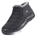 Black winter boot with gray lining on a white background