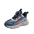Blue and black athletic shoe with orange accents on a white background