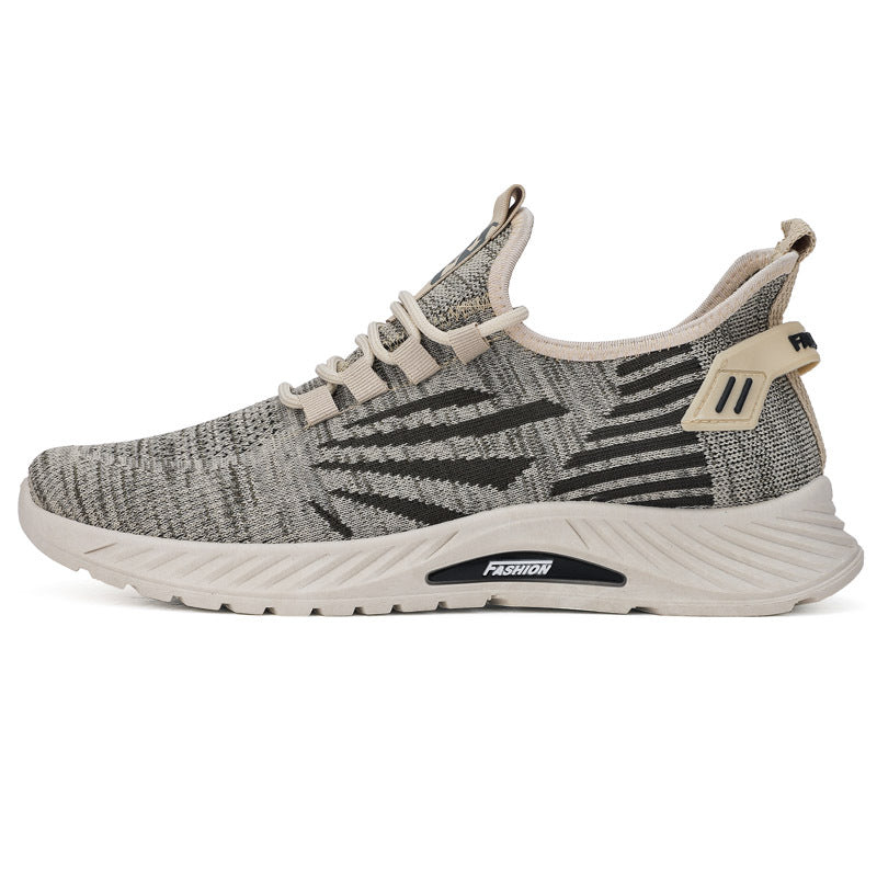 Gray and black sneaker with white sole on a white background