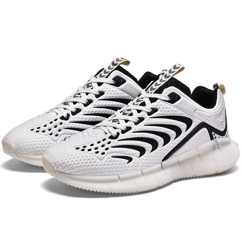 White and black athletic shoes on a white background