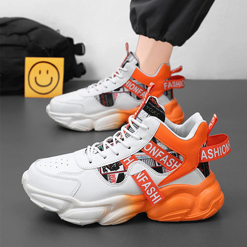 White and orange sneakers with 'ONFASH' branding on a gray surface.