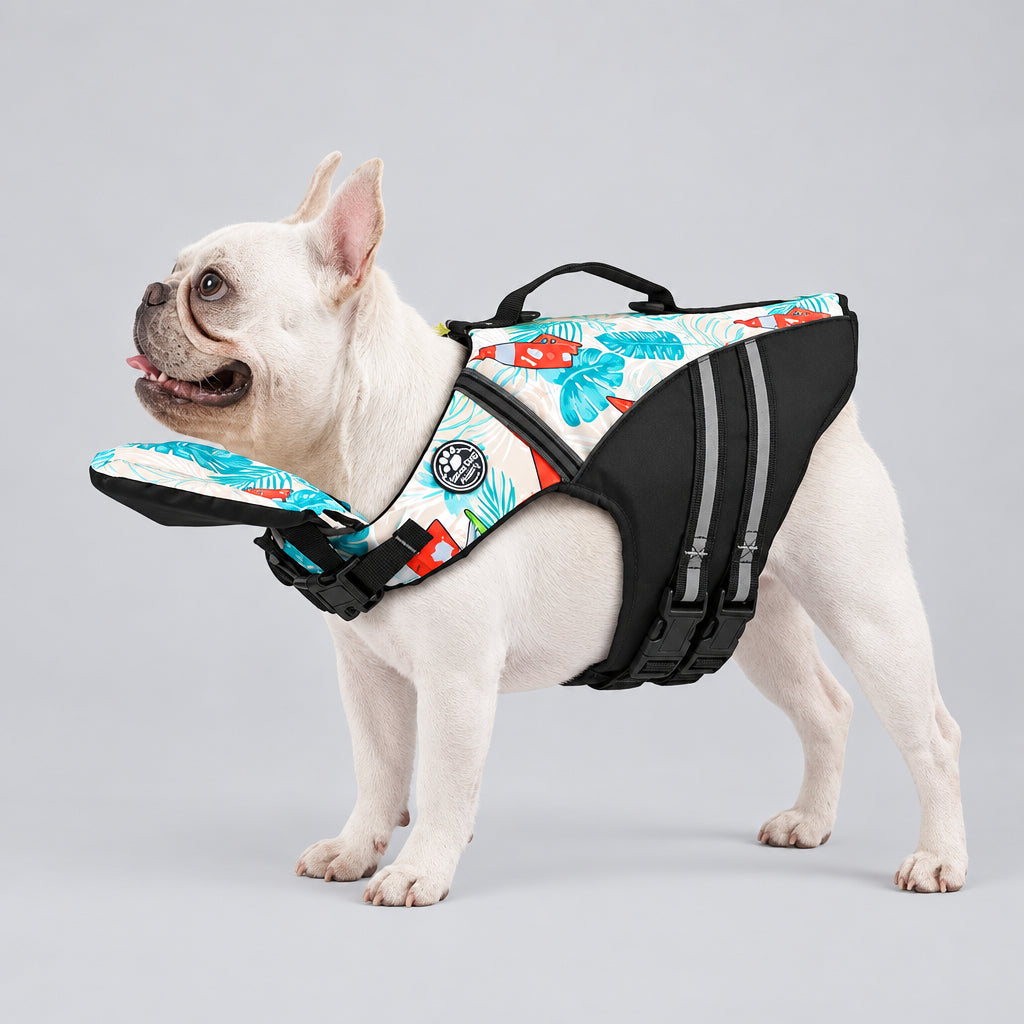 French Bulldog wearing a fish print patterned dog life jacket with chin float support and rescue handle UK
