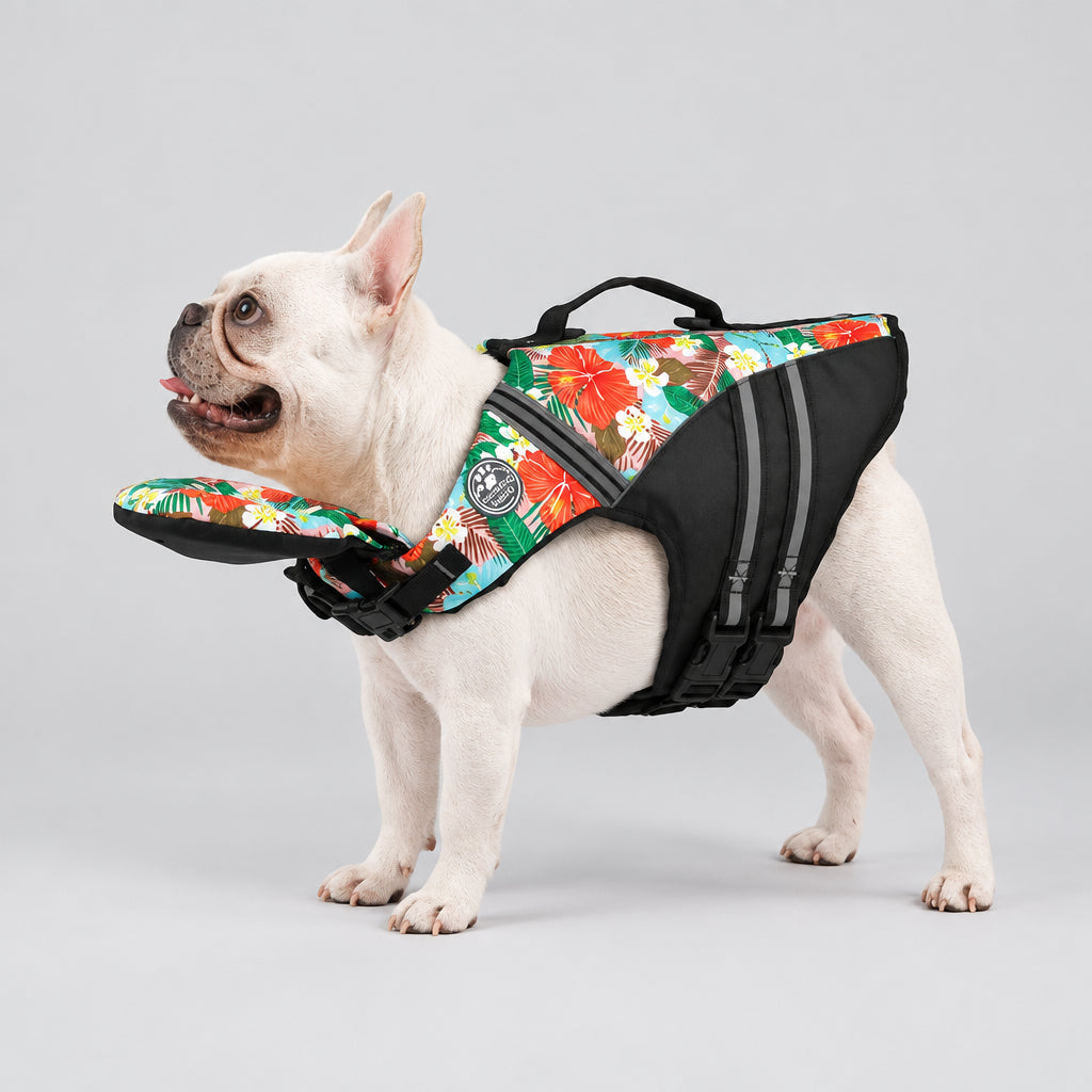 French Bulldog wearing a floral tropical print dog life jacket with chin float support and rescue handle UK